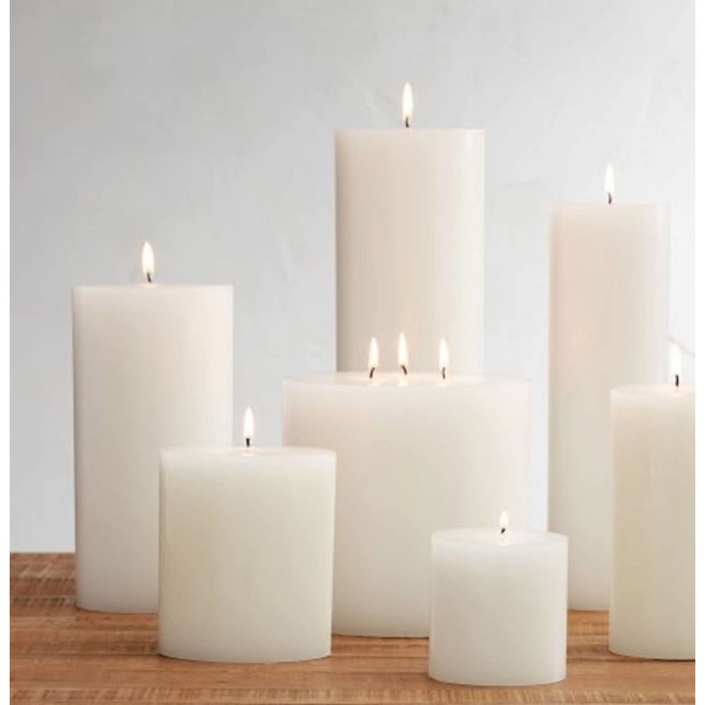 New! Pottery Barn 3”x10” unscented wax pillar candle in ivory